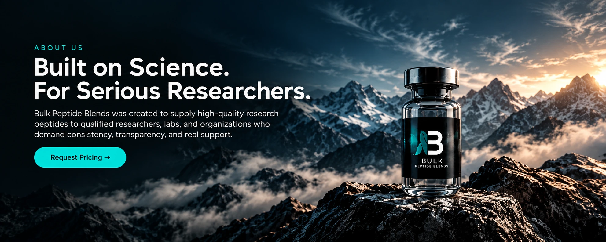 A Bulk Peptide Blends research vial on a rock outcrop above a range of snow-covered mountains and clouds.